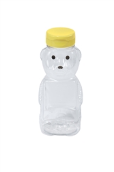 Little Giant 12 Ounce Plastic Bear Bottle made of BPA-free PETE plastic, featuring an adorable bear design with yellow flip-top lids and an area for honey labels.
