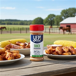 Blue Moon Yep! Shake Ranch Seasoning beside roasted chicken and herbs