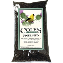 Bag of Coleâ€™s Niger Seed bird feed, perfect for attracting American Goldfinch and wild finches, displayed next to a Nifty Niger tubular feeder filled with seed.