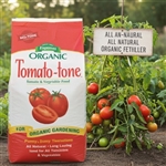 Tomato-tone 3-4-6 plant food package with vibrant tomato plants bearing plump, juicy tomatoes in the background, showcasing healthy growth and abundant fruit.