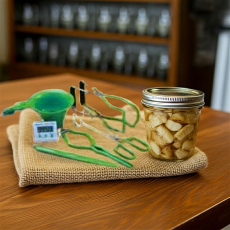 Presto 7-Function Canning Kit with digital timer, funnel, jar lifter, tongs, bubble remover, and jar wrench