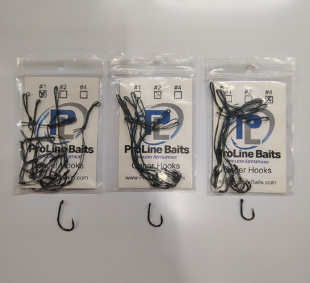 Close-up of ProLine Gaper Hooks pre-tied in packs of 8 with wide gape and micro barbs