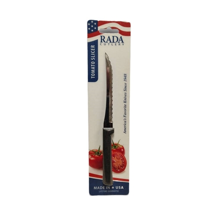 Rada Tomato Slicer W226 with black resin handle and 5 inch serrated blade slicing ripe tomato cleanly on kitchen cutting board